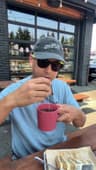 The creator behind Seattle Foodie Adventure tasting food at a local café